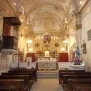 Brondello-Parrocchiale dell'Assunta-Fonte battesimale interno verso presbiterio