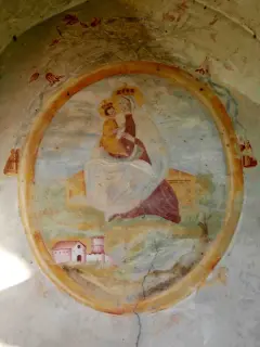 In facciata, ovale con Madonna, Bambino e modellino della chiesa - Cappella di San Bernolfo a Mondovì