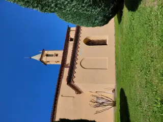 Fianco e campanile - Chiesa di San Giovanni Battista o Madonna del Carmine a Piasco