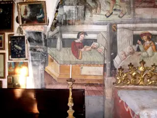 Storie di San Giuliano - la moglie ospita i suoceri - Cappella di San Giuliano a SaviglianoFrazione San Giuliano