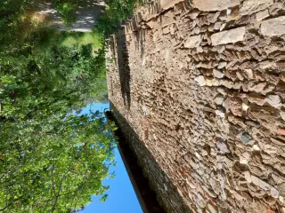 Fianco e materiali romani di reimpiego - Ex Chiesa di San Saturnino a Susa