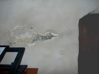 Parete Est, lacerto con iscrizione - Chiesa di San Giovanni Battista a Caraglio